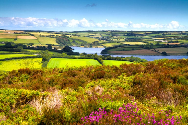 "Wimbleball Lake Exmoor National Park Somerset.  It is well known for its activity centre and is popular for walking, camping, birdwatching, angling, sailing, windsurfing, canoeing, rowing and kayaking."